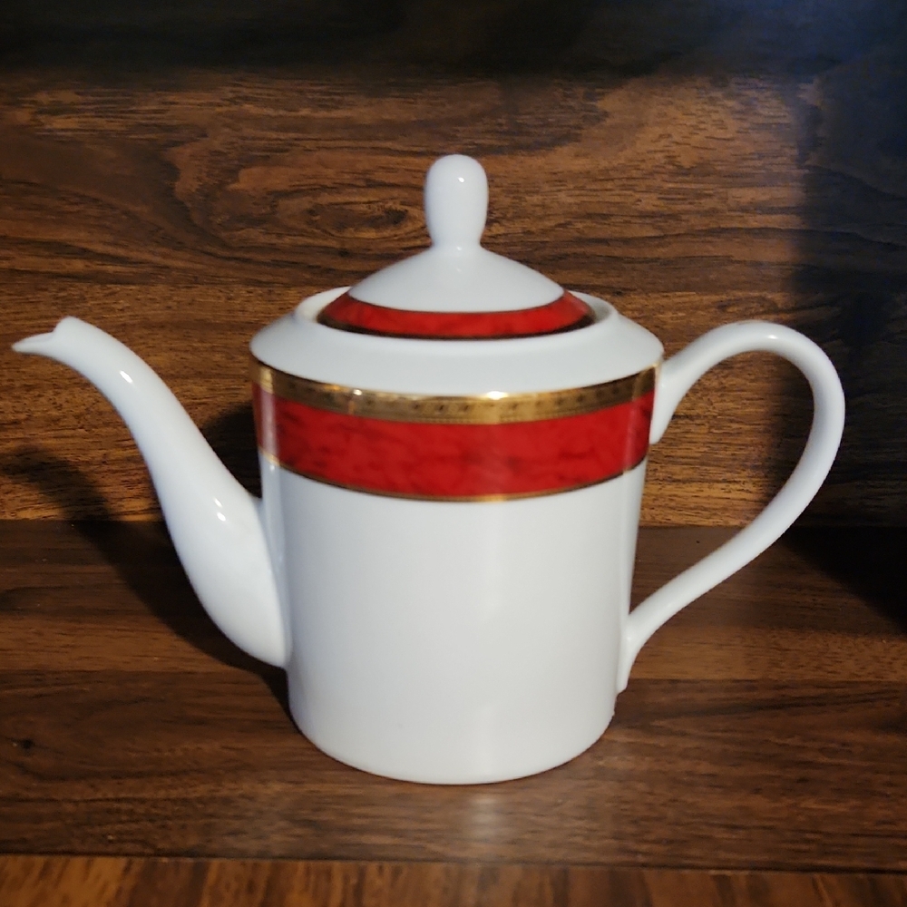 Elegant White Teapot with Red and Gold Accents